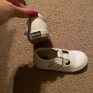 White ked kid shoes